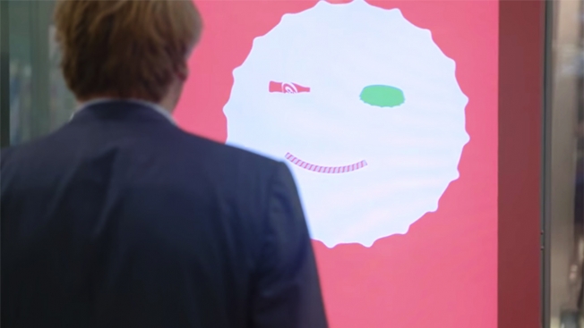 This Interactive Coke Ad in a Subway Station Winks and Smiles When You Do