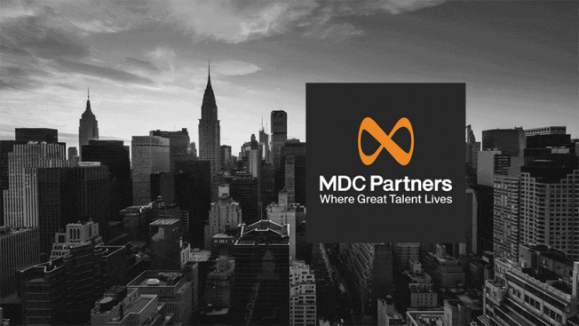 the new york skyline with the mdc partners logo in the foreground