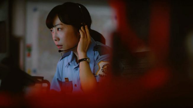 911 operator in a still from Jo Motoyo's film Midnight