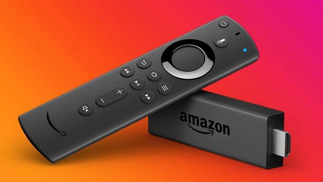 amazon fire tv dongle and television remote