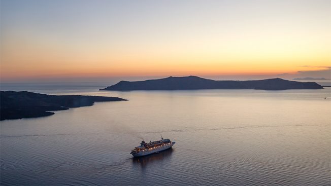 Cruise ship at sunset in Greece