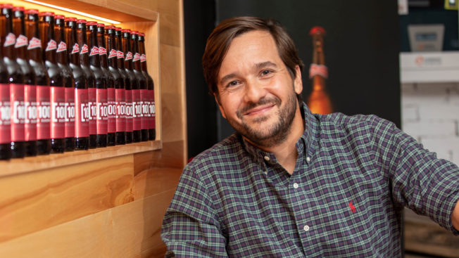 pedro earp next to a line of AB InBev products