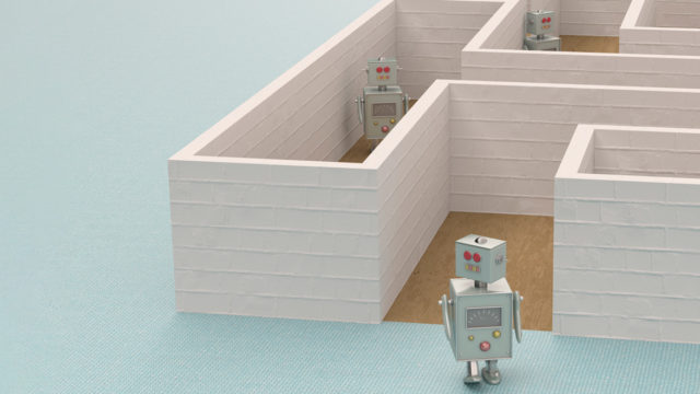 Three robots in different parts of a maze