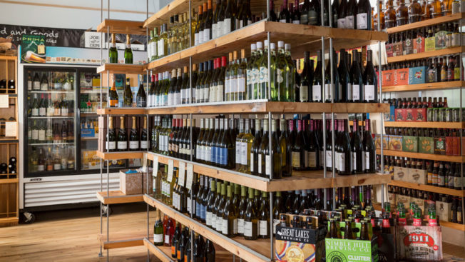 shelves full of wine bottles