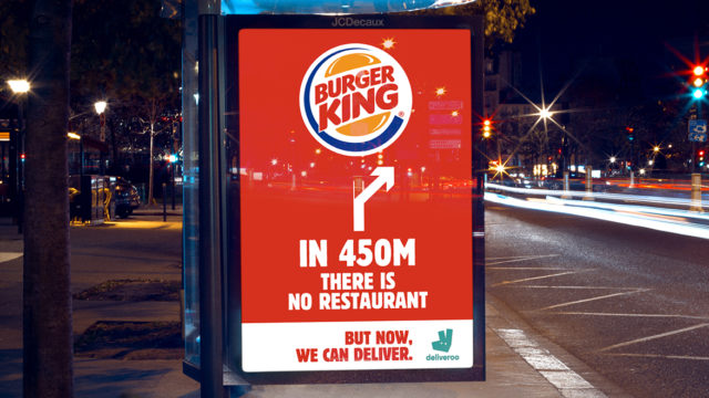 A Burger King outdoor ad says that in 450 meters there is no restaurant