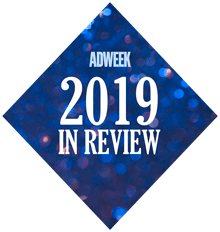 says adweek 2019 in review in a blue sparkly diamond