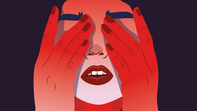 a woman's face in red covering her eyes