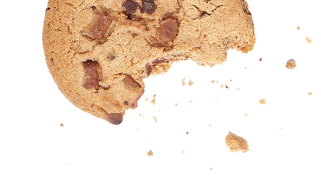 Directly Above Shot Of Chocolate Chip Cookie On White Background