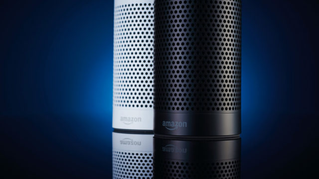 A pair of Amazon Echo multimedia smart speakers