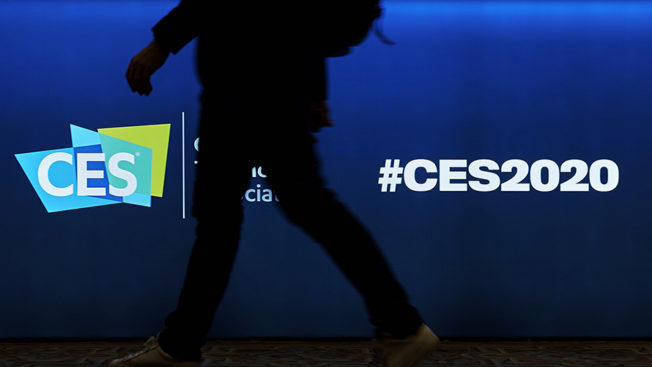 CES logo with a silhoutted person in front