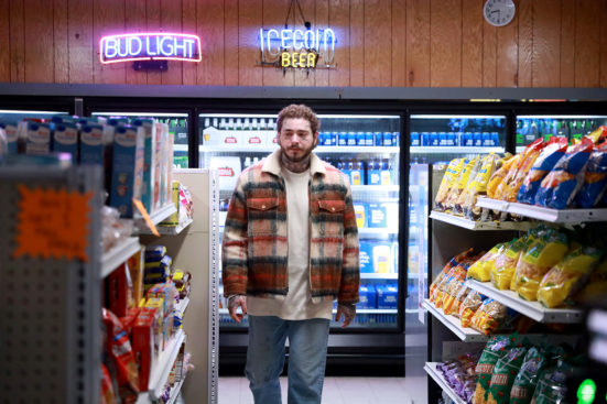 post malone standing in a convenience store