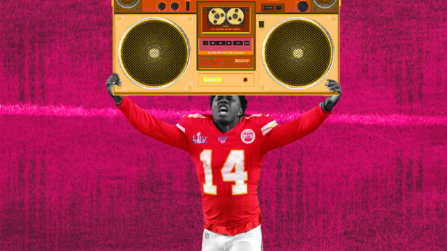 a football player in a red no. 14 jersey with a boombox on his head