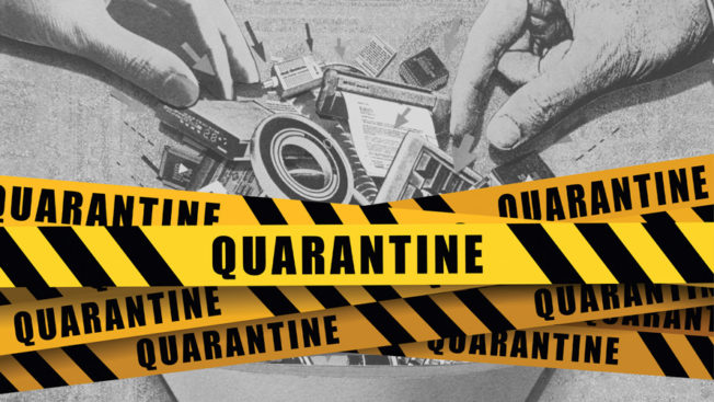 quarantine yellow tape with hands in the background