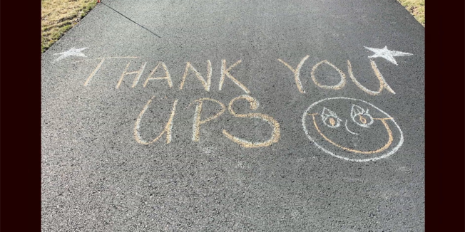 thank you UPS written on a road