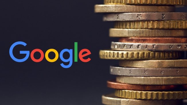 google logo next to a stack of coins