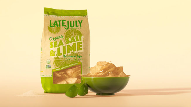 Bag and bowl of Late July lime tortilla chips