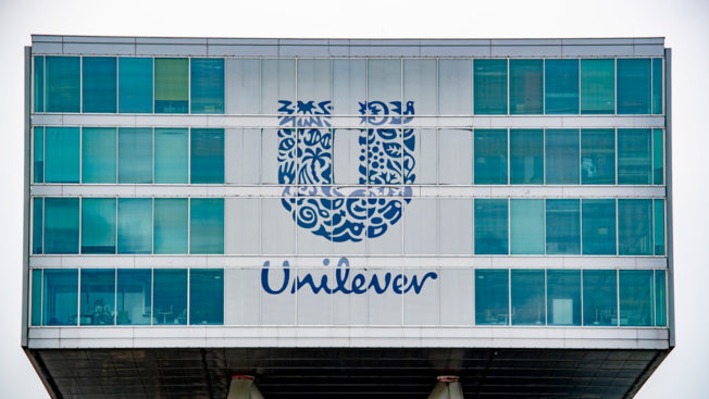 a giant sign with a U and underneath says unilever on a building