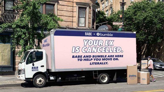 a pink moving truck that says your ex is canceled