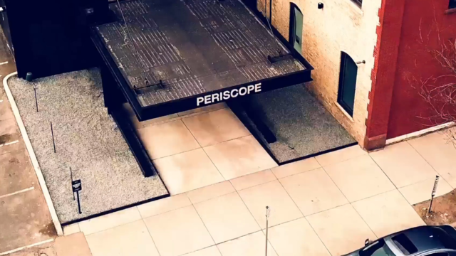 the top of a building that says periscope