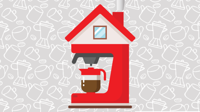 a red coffeemaker on a gray background