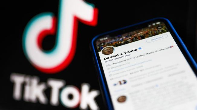 TikTok and smartphone showing Trump's Twitter account