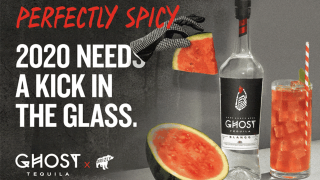billboard that says perfectly spicy 2020 needs a kick in the glass next to tequila bottle and fruits