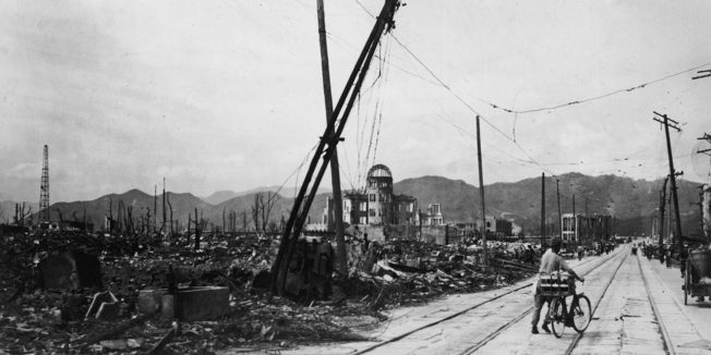 black and white photo of a devastated hiroshima after the bomb fell