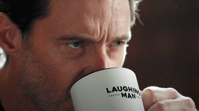 Hugh Jackman drinking coffee