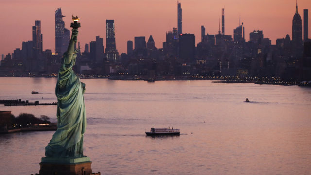 Photo of the Statue of Liberty and New York City