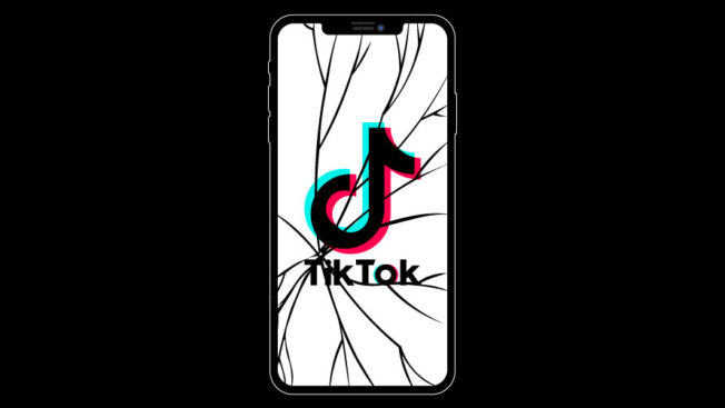 TikTok logo on shattered phone