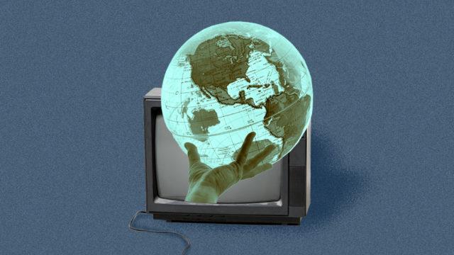 a globe coming out of a television screen