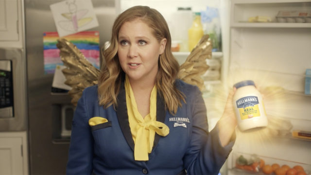 amy schumer holding a hellmann's mayo container