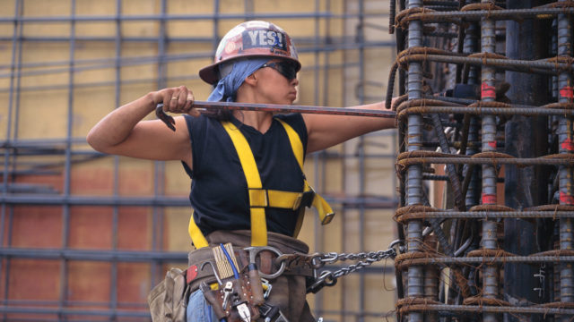 A woman working with rebar