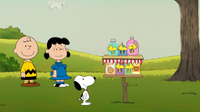 The Peanuts gangs looks fondly at a new birdhouse made of recycled materials