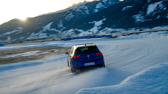 Volkswagen car driving through snow