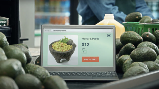 a laptop screen with an image of a bowl placed in a bin of avocados