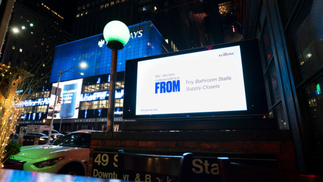 A digital billboard in NYC at night