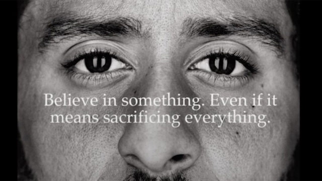 Colin Kaepernick's face appears behind the text Believe in something. Even if it means sacrificing everything.