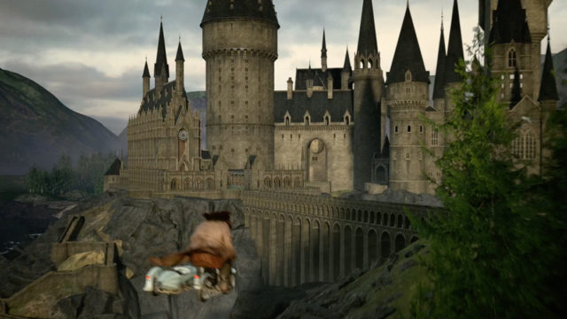 flying on a broomstick toward hogwarts castle