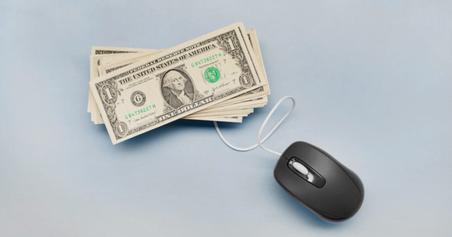 a mouse connected to dollar bills