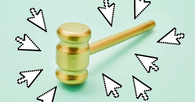 computer arrows pointing to a gavel