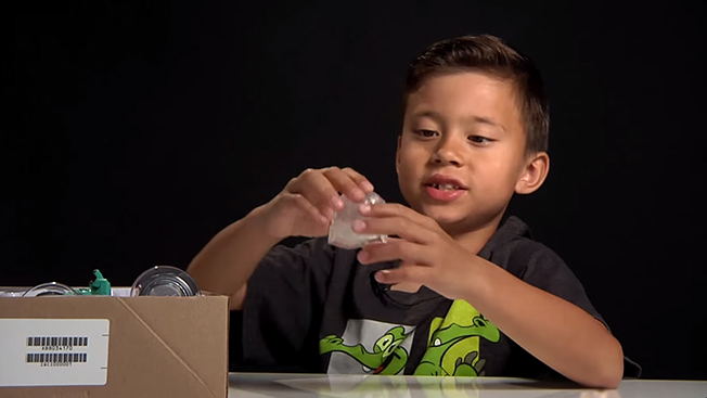kid unboxing toys
